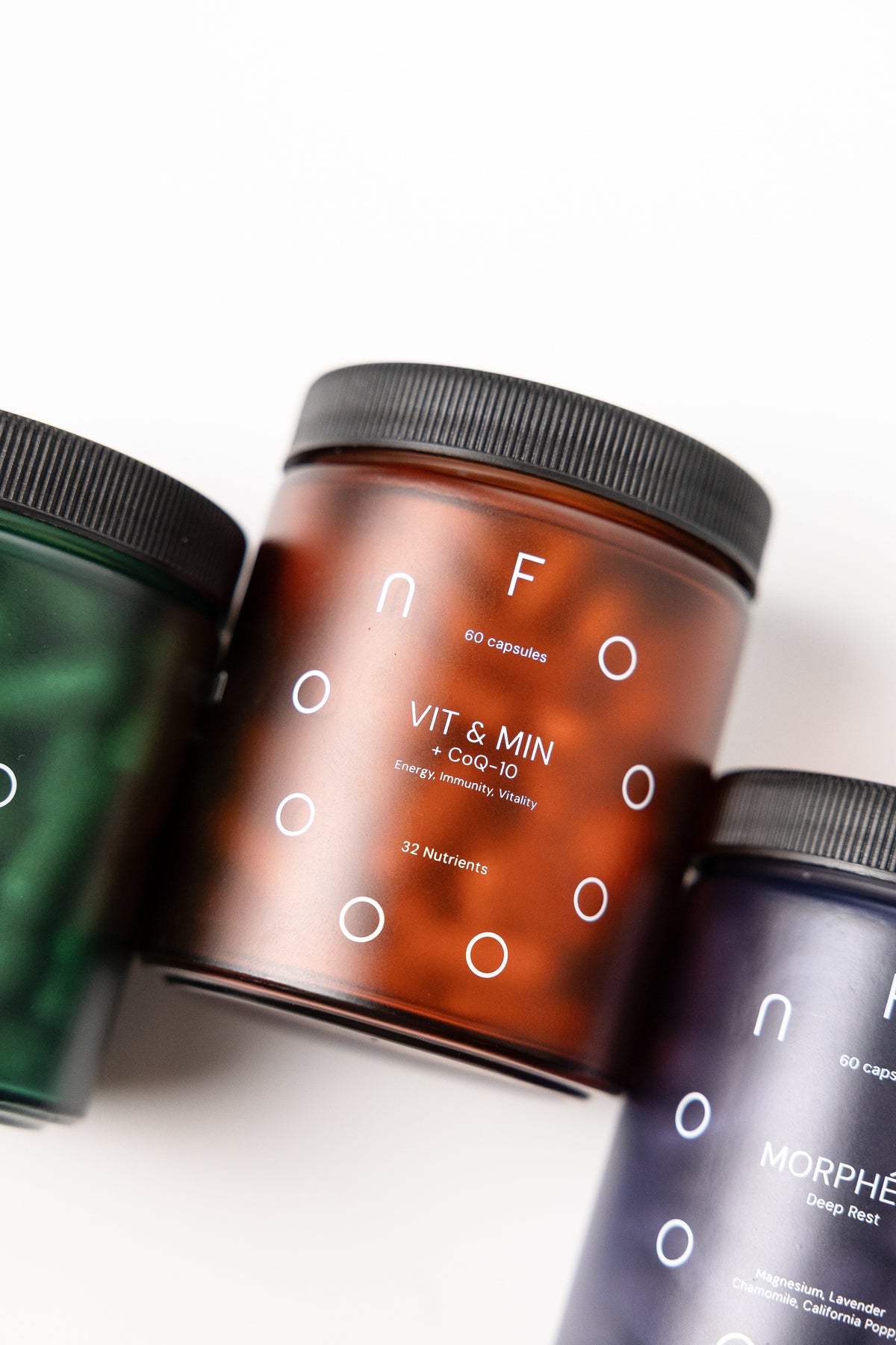 FOOON VIT and MIN plus CoQ10 liposomal multivitamin jar with orange capsules, a source of vitamin C