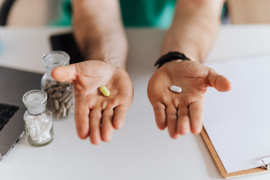 Doctor explaining medication at a table, nootropics safety and side effects